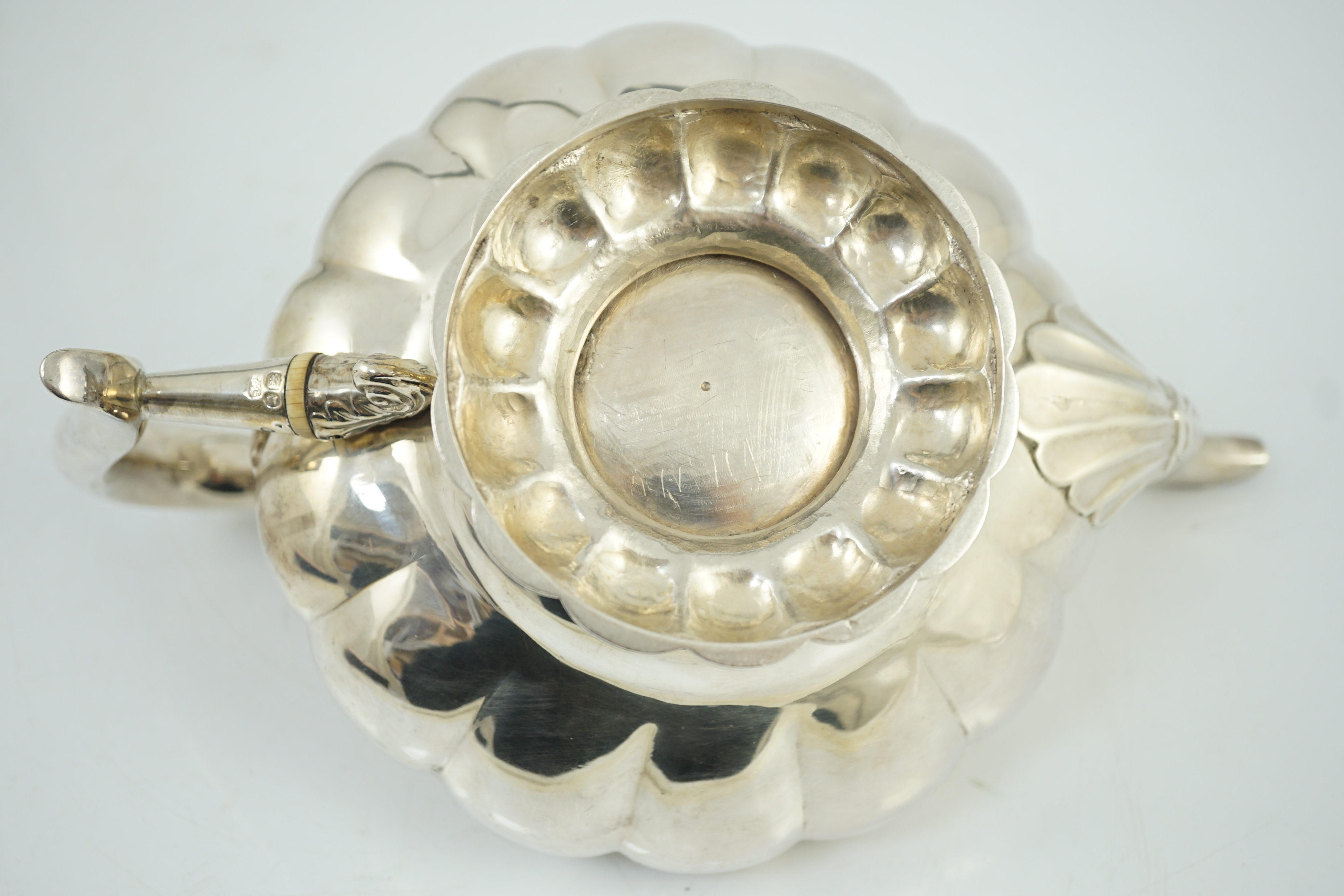A George IV silver melon shaped pedestal teapot, by Joseph Angell I